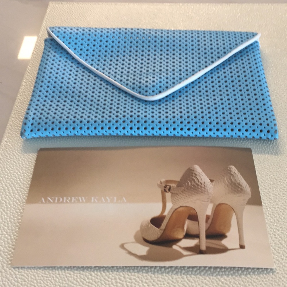 Andrew Kayla blue leather clutch